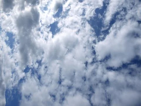 Fluffy clouds in the sky Stock Photos