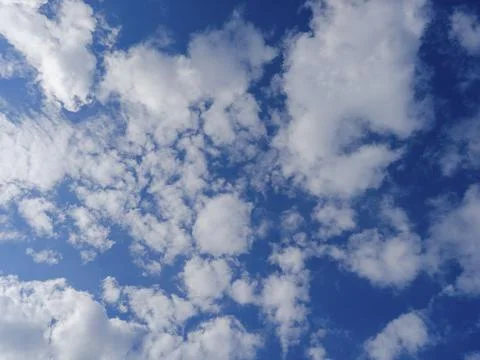 Fluffy clouds in the sky Stock Photos