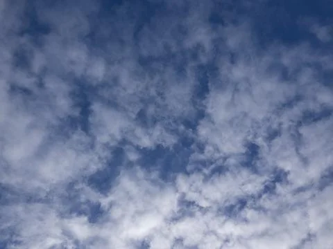 Fluffy clouds in the sky Stock Photos