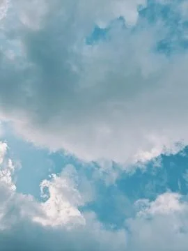 Fluffy clouds in sky Stock Photos