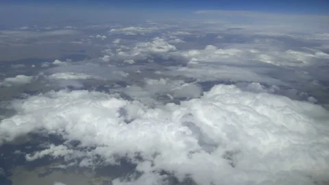 Fluffy clouds. View from the airplane. Stock Footage 91238512