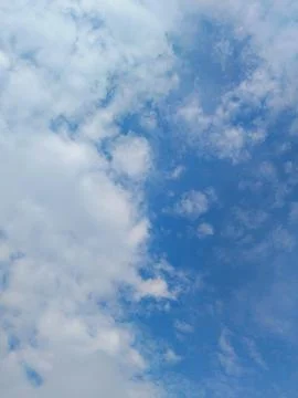 Fluffy Cloudscape: A Serene Blue Sky Background Stock Photos