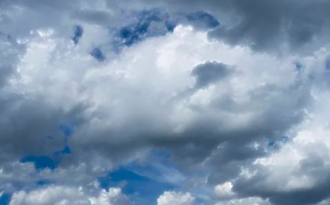 Fluffy cloudy blue sky scape 041 Stock Photos