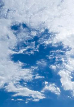 Fluffy cloudy blue sky scape 021 Stock Photos