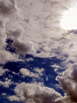Fluffy cloudy deep blue sky scape 091 Stock Photos