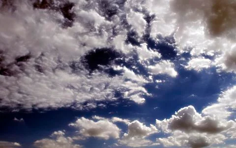 Fluffy cloudy deep blue sky scape 141 Stock Photos