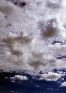 Fluffy cloudy deep blue sky scape 081 Stock Photos