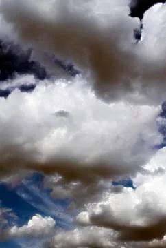 Fluffy cloudy deep blue sky scape 071 Stock Photos