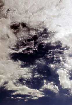 Fluffy cloudy deep blue sky scape 021 Stock Photos