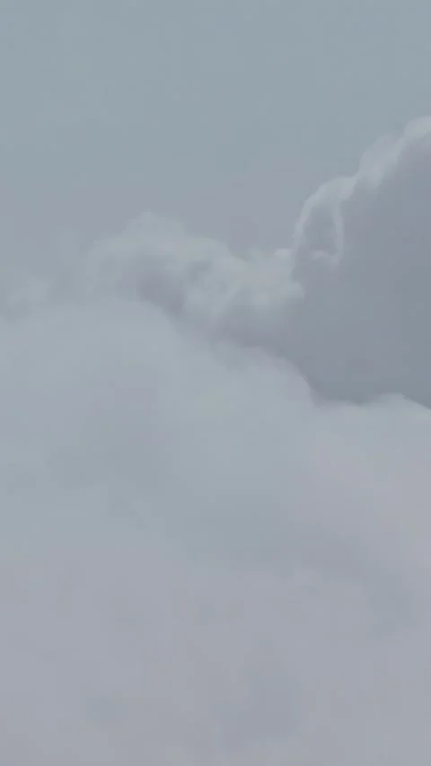 Fluffy Cumulus Clouds with Fog - Vertical Aerial View - Hyperlapse Stock Footage 339039855
