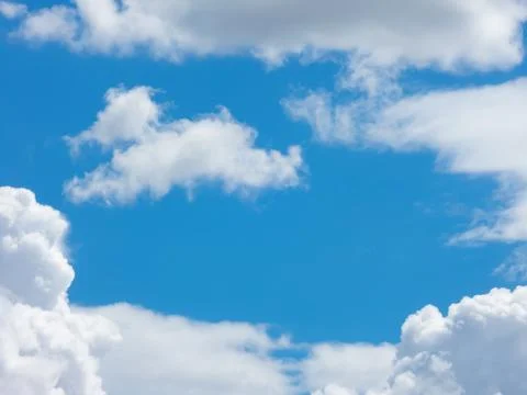Fluffy cumulus clouds Stock Photos