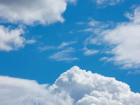 Fluffy cumulus clouds Stock Photos