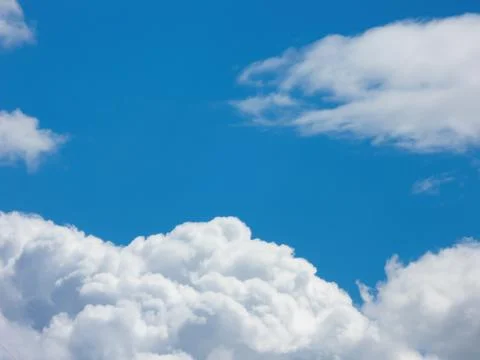 Fluffy cumulus clouds Stock Photos