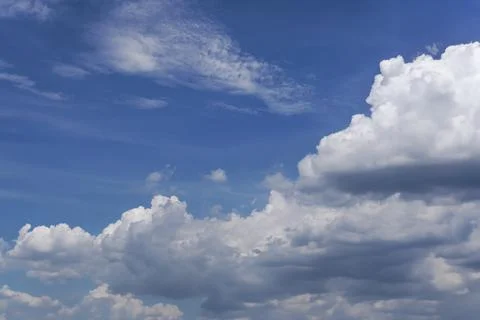 Fluffy Cumulus in the Deep Blue Sky Stock Photos