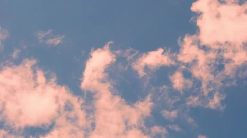 Fluffy Orange Pink Clouds In Blue Sky At Sunset In Sunlight Beautiful View, Time Stock-Footage 313289169