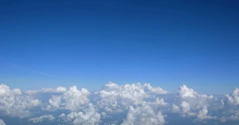 Fluffy Popcorn Clouds from Airline Passenger Perspective 库存影片 82531321