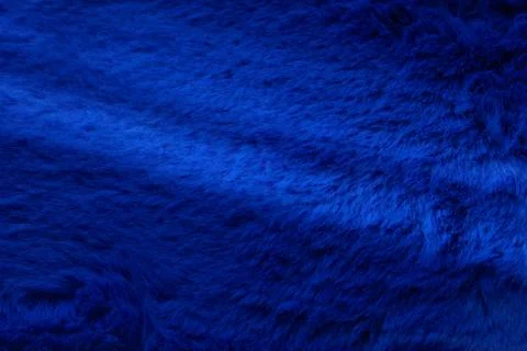 Fluffy soft texture of colored wool of a trendy. Stock Photos