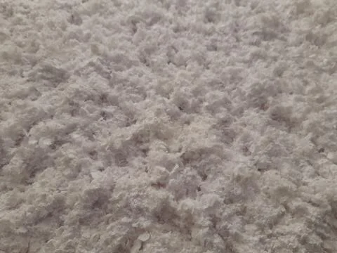 Fluffy surface. Flake surface. Fluffy cereal background Stock Photos