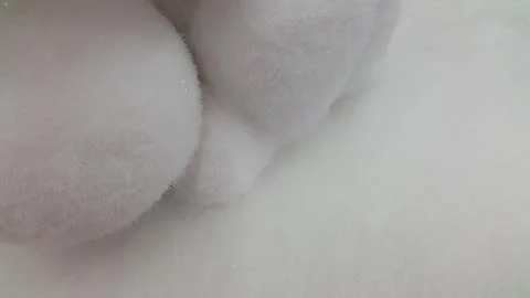 Fluffy texture. Soft white fluffy surface. Fuzzy background Stock Photos