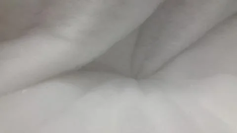 Fluffy texture. Soft white fluffy surface. Fuzzy background Stock Photos
