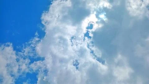 Fluffy Thick Cumulus Clouds Over Rural Village Landscape at Daytime Stock-Fotos