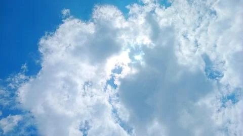 Fluffy Thick Cumulus Clouds Over Rural Village Landscape at Daytime Stock-Fotos