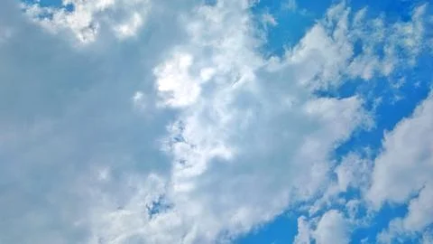 Fluffy Thick Cumulus Clouds Over Rural Village Landscape at Daytime Stock-Fotos