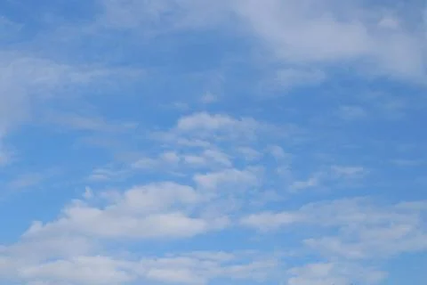 Fluffy white cloud in blue sky. Stock Photos
