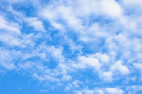 Fluffy White Clouds in a Blue Sky 스톡 사진