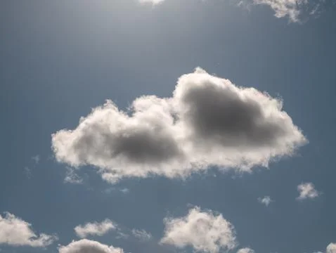 Fluffy White Clouds in Blue Sky Photos
