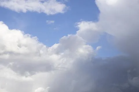 Fluffy White Clouds in Blue Sky, Beautiful Cloudscape Background. 写真素材