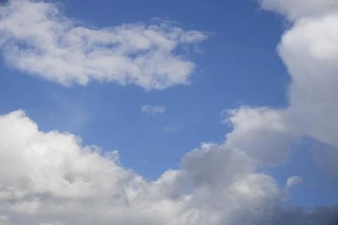 Fluffy White Clouds in Blue Sky, Beautiful Cloudscape Background. 写真素材