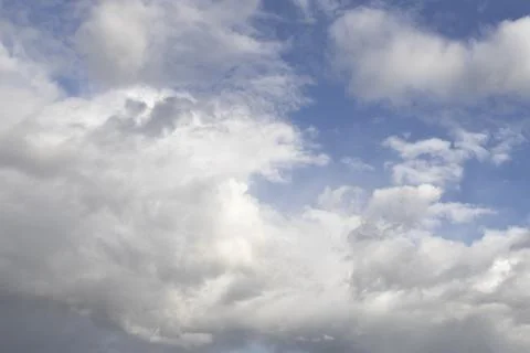 Fluffy White Clouds in Blue Sky, Beautiful Cloudscape Background. Photos