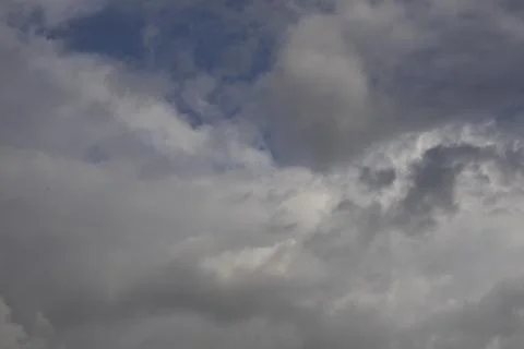 Fluffy White Clouds in Blue Sky, Beautiful Cloudscape Background. Overcast .. Photos