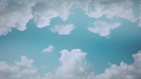 Fluffy White Clouds Drifting in Serene Blue Sky Creating a Dreamy Atmospher.. Video stock 311793765