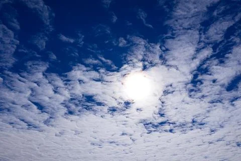 Fluffy white clouds floating in blue sky. Soft cloudscape. Cumulus clouds w.. Photos