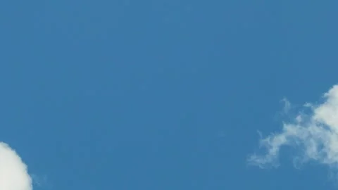 Fluffy White Clouds Fly Away And Remain Clear Sunny Blue Cloudless Sky Time Laps Stock Footage 313527049