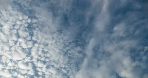 Fluffy white clouds moving over the sky Stock-Footage 94256348