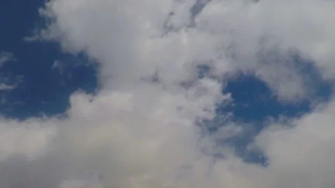 Fluffy White Clouds Over Blue Sky Stock-Footage 94104410