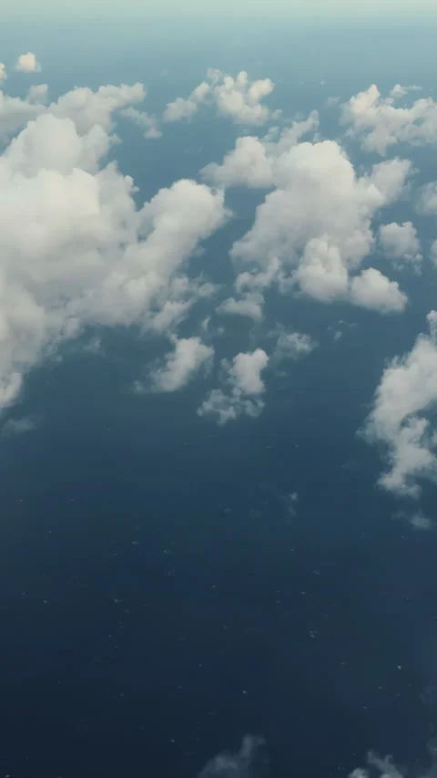 Fluffy white clouds pattern on bright deep blue sky background, Stock Footage 346634541