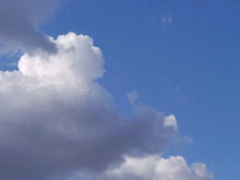 Fluffy White Clouds Stock Photos