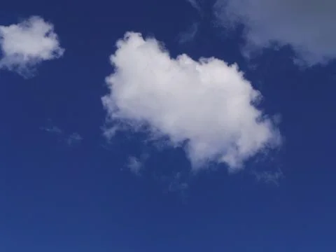 Fluffy White Clouds Stock Photos