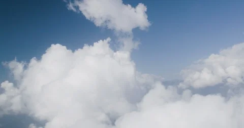 Fluffy white clouds in the sky Stock Footage 145264736