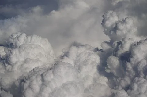 Fluffy white clouds in the sky Stock Photos