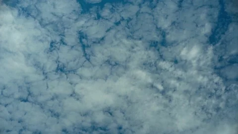 Fluffy white clouds  timelapse. Background of white clouds. Stock Footage 239253494