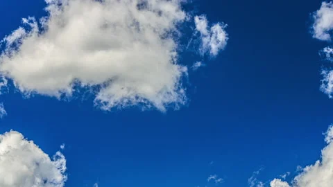 Fluffy White Cumulus Clouds - Timelapse 動画素材 203804432