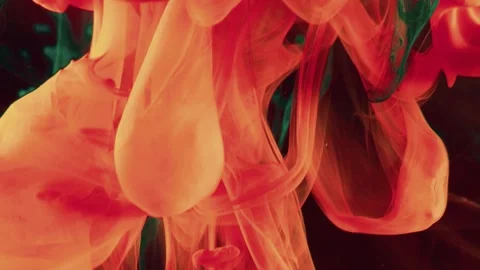 Fluid art motion with dynamic flowing red and green ink in dark water Stock Footage 327572099