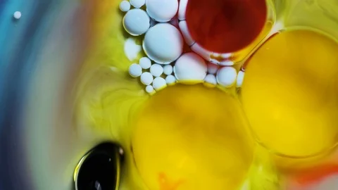 Fluid art. Paint reacts creating an abstract swirl. Stock Footage 120696265