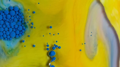 Fluid art. Paint reacts creating an abstract swirl. Stock Footage 120697019