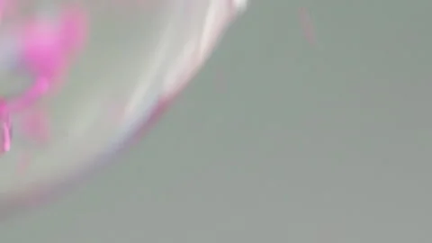 Fluid bubbles water oxygen pink blue color droplet Stock Footage 261719976